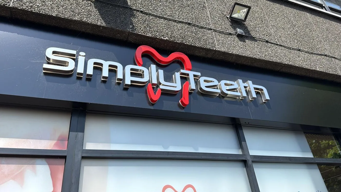 Clean fascia sign and glazing at SimplyTeeth in Romford